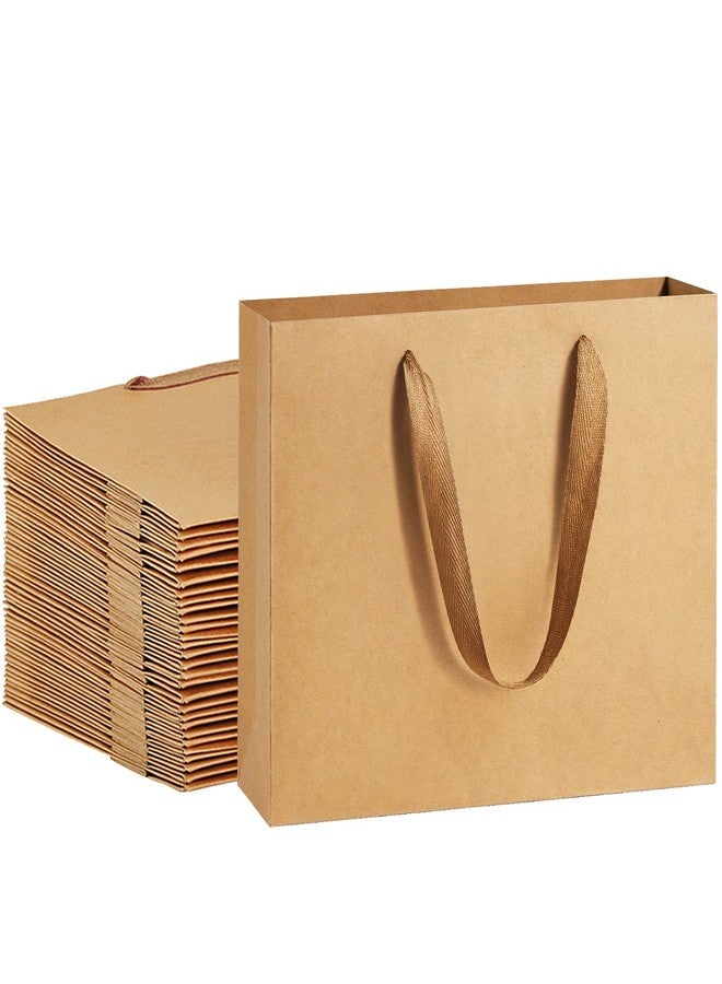 أكياس ورقية من BagDream، مقاس 10.6 × 3.1 × 8.3 بوصة، 25 قطعة، أكياس هدايا متينة من ورق كرافت بني اللون، مزودة بمقابض وقماش ناعم، أكياس هدايا للحفلات، أكياس تسوق، أكياس بضائع التجزئة، أكياس هدايا لحفلات الزفاف - Image 1